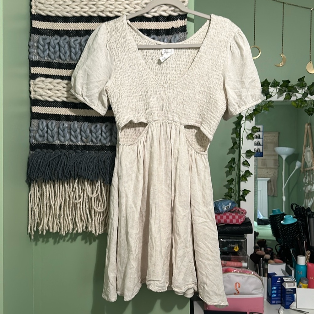 Linen smocked dress with cutouts